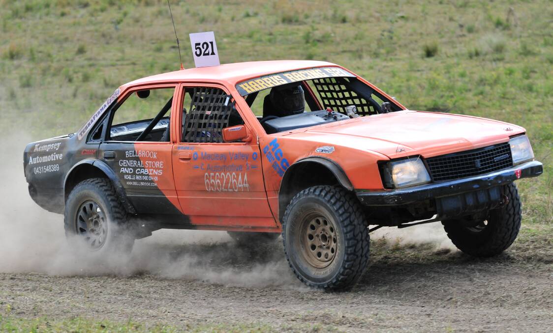 Kempsey Macleay Off Road Club (KMORC) racer Steve Harris and his Commodore sum up the spirit of the budget off road racer. 