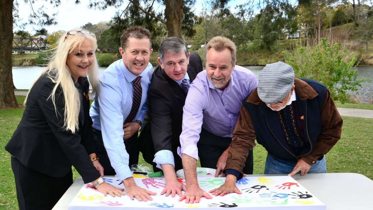 ❑ Helping hands: Real Futures managing director Wendy Yarnold, the member for Cowper and Assistant Minister for Employment Luke Hartsuyker, John McNamara from employment service provider Generation One, federal Indigenous Employment Minister Nigel Scullion and Uncle Bob Smith in Kempsey in 2014