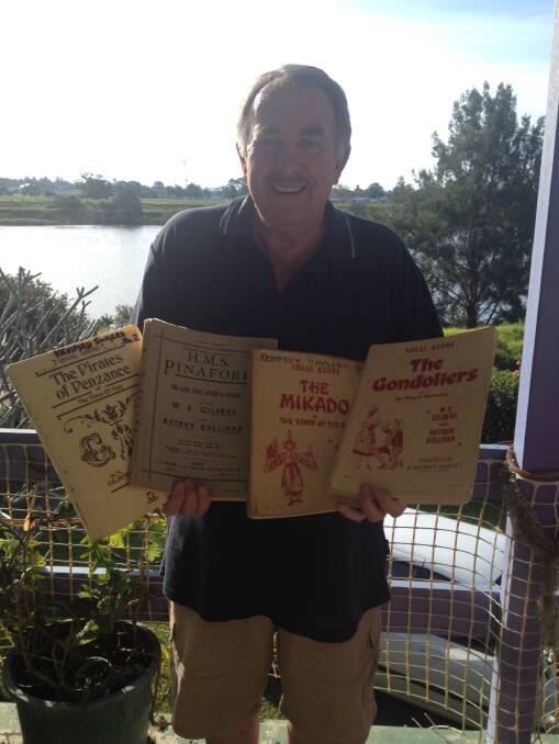 MASTERPIECES: Director Greg Taylor holding some of Gilbert and Sullivan's original scripts.