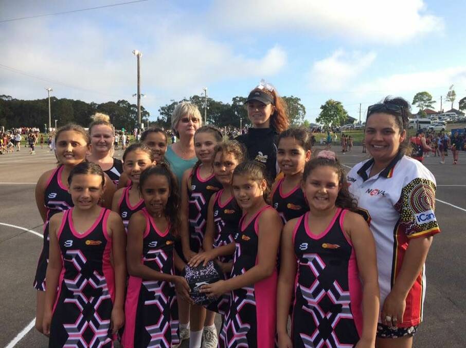 DIAMONDS ARE A GIRL's BEST FRIEND: The Dunghutti Diamonds on court in Charlestown at the 18th Koori Netball Tournament.