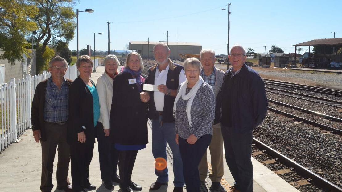 100 YEARS: Organisers of this weekend's centenary of Kempsey Railway celebrations with Jeanette Rainbow and Barry Seghers who provided them with a donation. Photo: Callum McGregor.