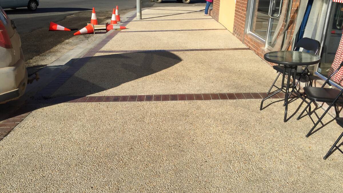 ON THE RIGHT PATH: The exposed decorative concrete footpath on Elbow St has improved the aesthetics of the area.