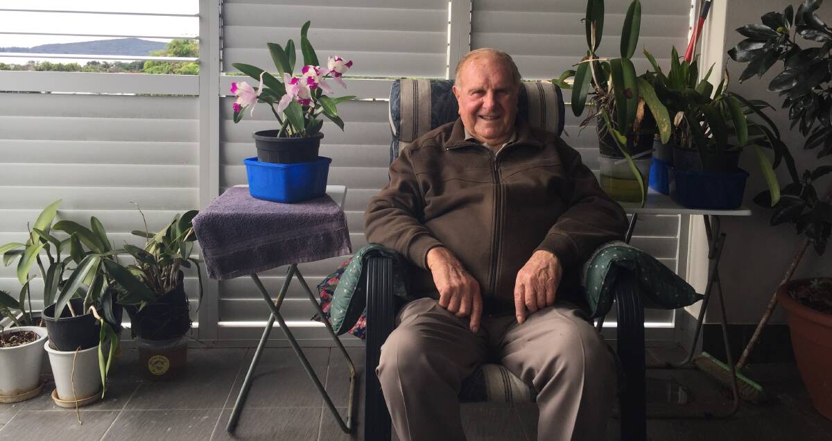 A WONDERFUL LIFE: Aubrey Rudder reflects fondly on life in the Macleay, while sitting in his favourite chair on the deck of his South West Rocks apartment. Photo: Tom Bushnell.