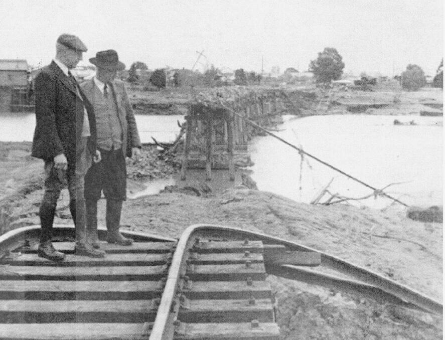 Inspecting damage to the railway bridge in 1949