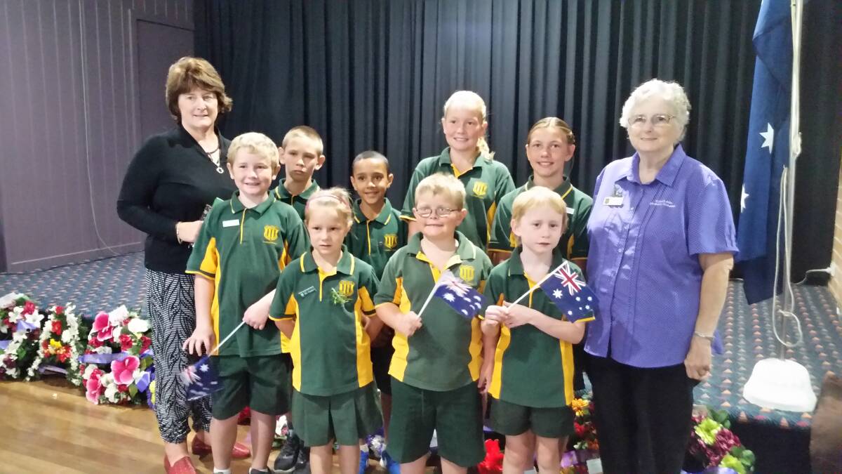 School principal Kylie Nicholson, students and Lorraine Daelman at the ANZAC Day service