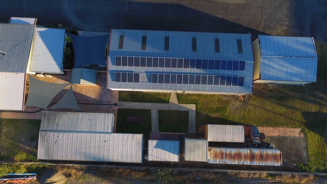 The gap (bottom left of main shed) shows where the solar panels once were