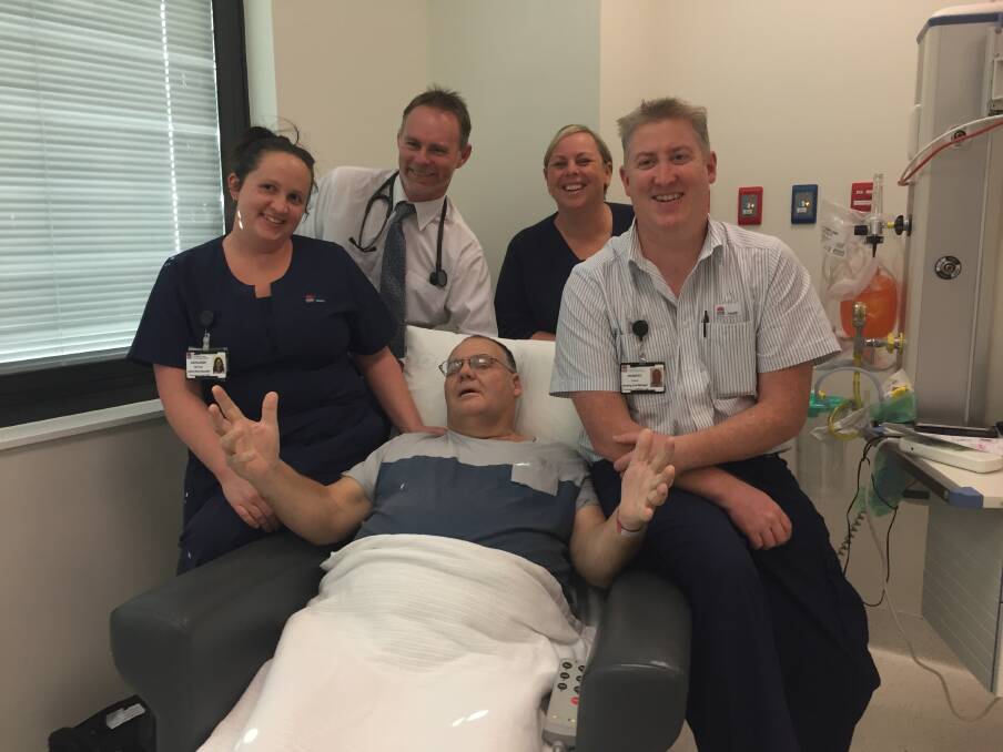 High praise: Clinical nurse specialist Ash McHugh; interventional cardiologist Dr Andrew French; acting nurse unit manager for coronary care unit Donna Hughes and cardiac cath lab nursing unit manager Rob Keane with Stephen Russell.