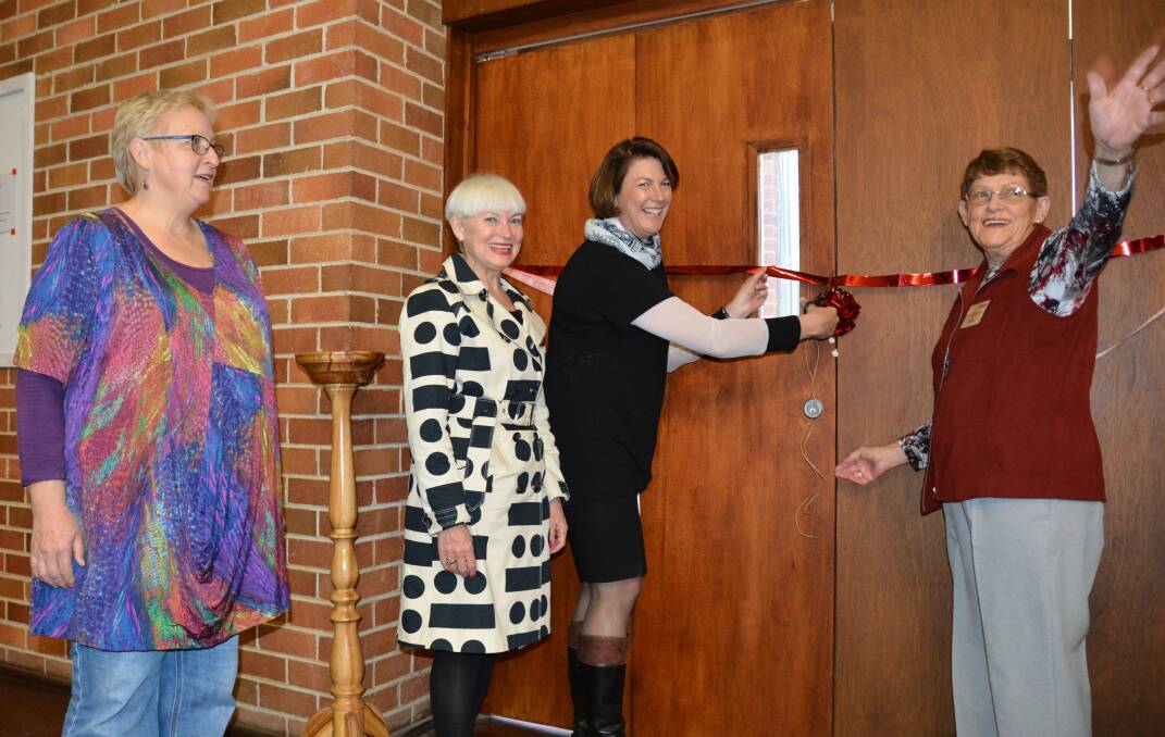 Member for Oxley Melinda Pavey cuts the ribbon with Anglican co-ordinator Nancy Fuller, Mayor Liz Campbell and Reverend Bronwyn Marchant.