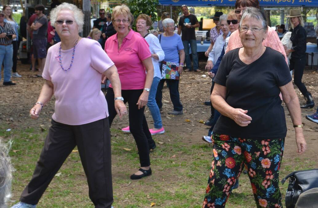 Kempsey line dancers had fun entertaining the crowds.