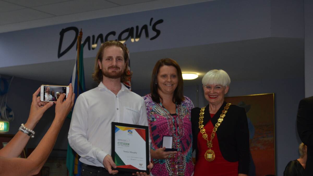 "Quiet achiever": Sonya Murphy (centre) was named Citizen of the Year for her tireless work with numerous community and sporting groups. Photo: Lachlan Leeming.