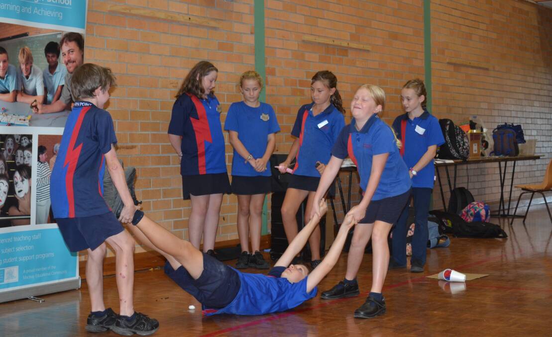 Acting up: Telegraph Point Primary School students during their performance at the end of the day. Photo: Lachlan Leeming.