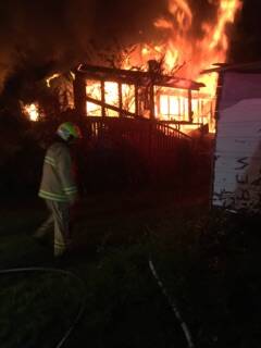 The home was ablaze by the time firefighters arrived. 