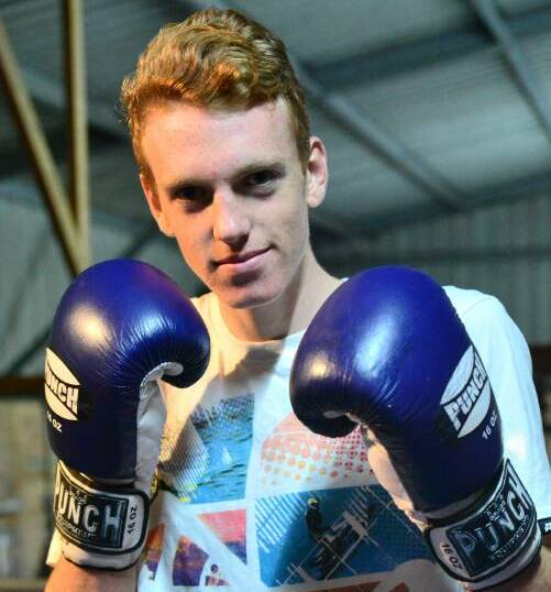 Gloves up: Lewis Lennon claimed a silver medal at the Golden Gloves boxing. 