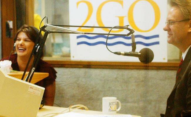 Radio star: Sarah with then Federal Labor leader Mark Latham at 2GO studios in Gosford in 2004. Picture: Bill Rosier.