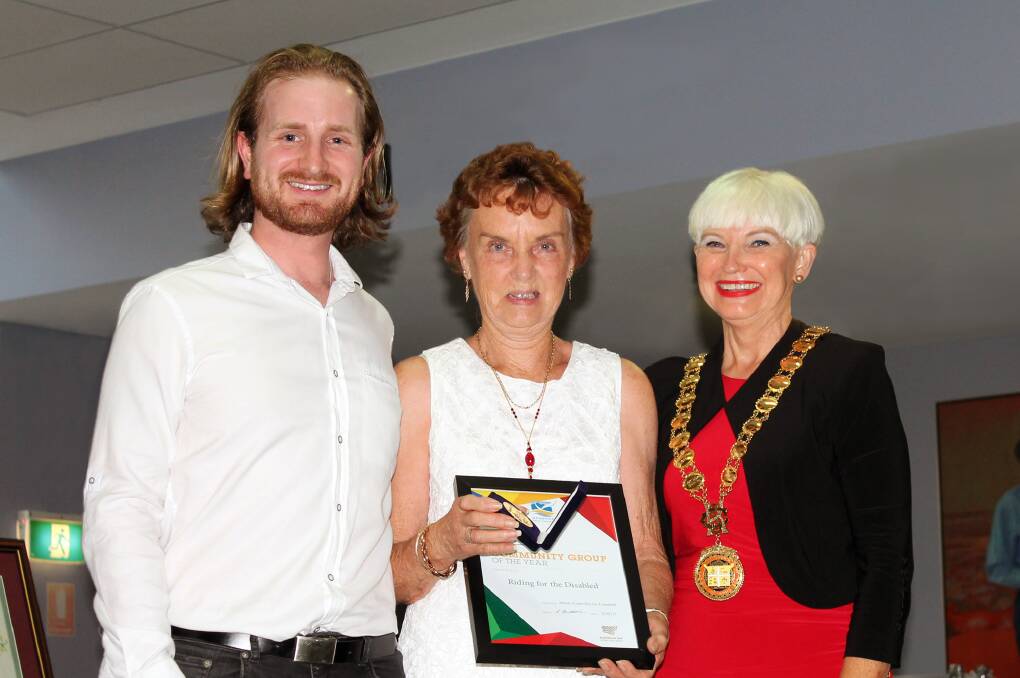 Enriching: Riding for the Disabled Kempsey-Macleay president Marie Purkis accepts the Community Group of the Year award on behalf of the group.