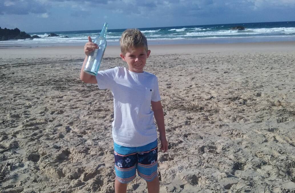 Message in a bottle: Tristan Scilinato was walking along the beach at Hungry Head when he found the bottle.
