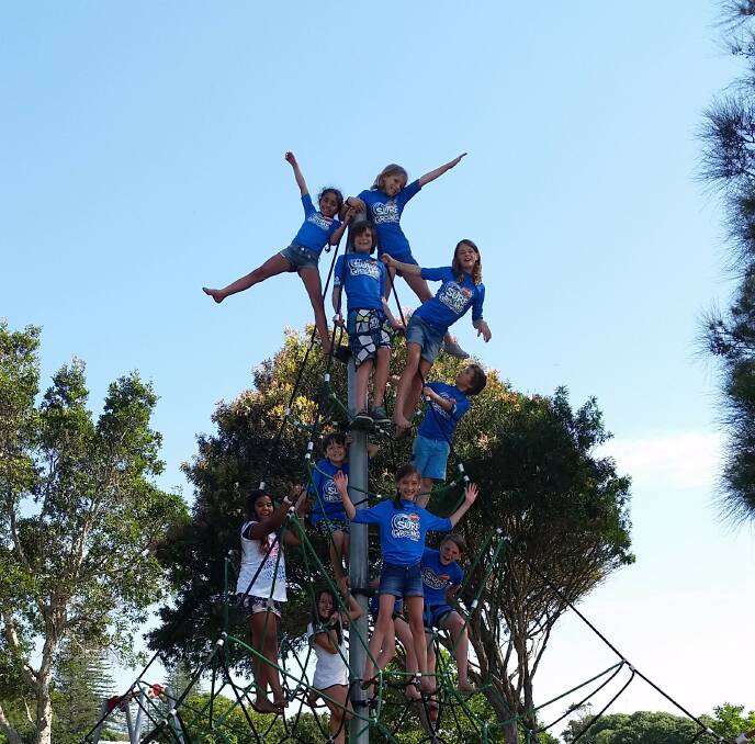 STUDENTS: Climbing to new heights with Tallowood Steiner School students on their spider web playground. It's time to enrol for the 2017 school year.