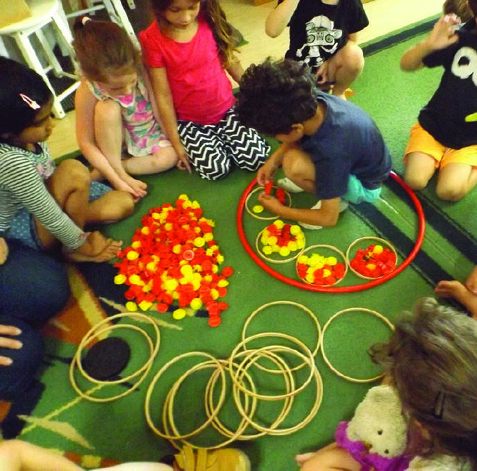 COUNTING: Students learn the importance of numbers and counting at the Kindergarten. An exciting place of learning for children aged 2 to 5 years old.