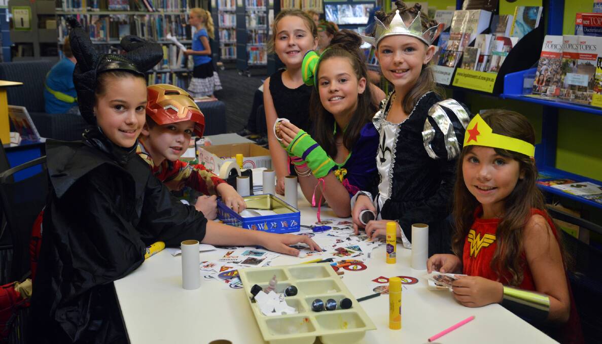 Dress ups: Students enjoy crafts at Kempsey Shire Library during Book Week, a calendar highlight.