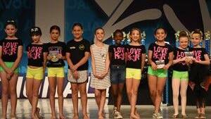 Vogue Junior Elite dance team receiving their highest scoring point award