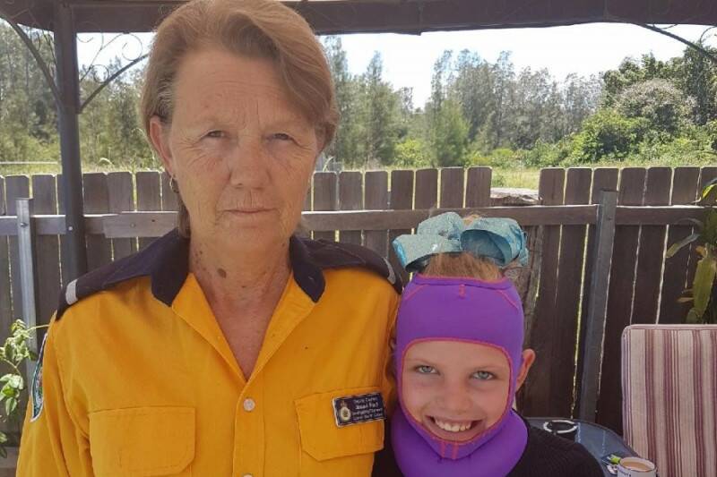 TROOPERS: Dondingalong Rural Fire Service volunteer Jacqui with her 11-year-old granddaughter who suffered burns to her torso and leg following an incident with a lighter.