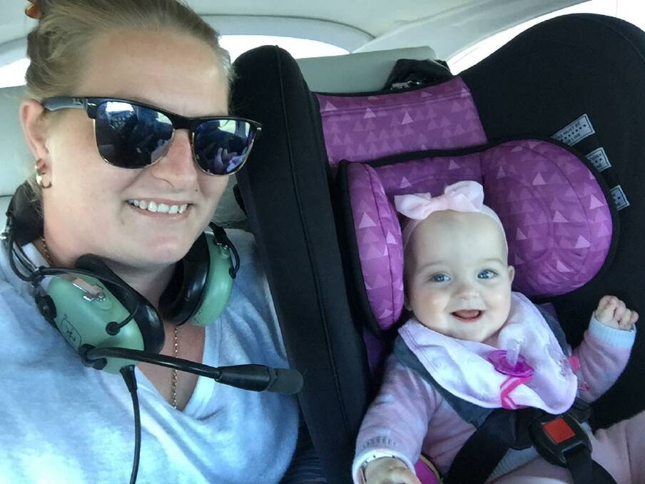 Baby Elvie and her mum Lindsie's first trip in the Angel Flight plane.
