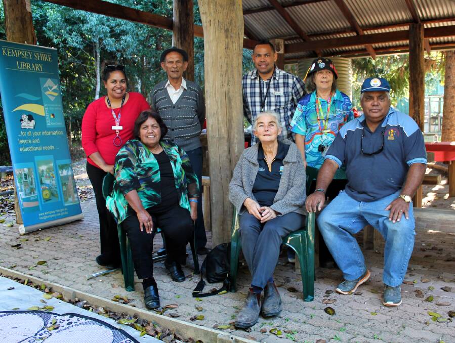 Kempsey Shire Library staff Ruth Waite and Angie Meers with local elders and representatives from the Australian Red Cross at the NAIDOC Week storytime session at Wigay Park on Tuesday.