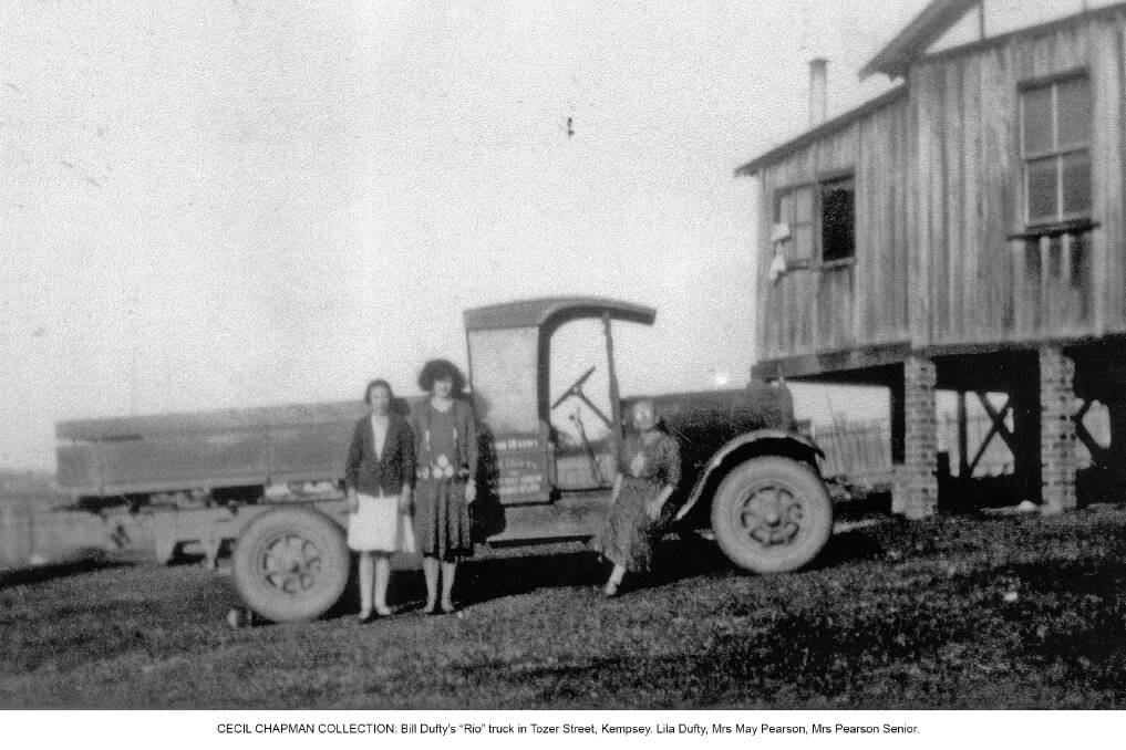 CECIL CHAPMAN COLLECTION: Bill Dufty’s “Rio” truck in Tozer Street, Kempsey. Lila Dufty, Mrs May Pearson, Mrs Pearson Senior. 
