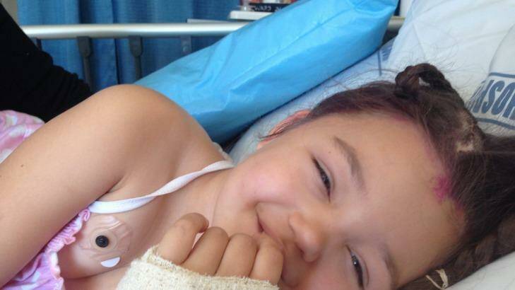 CHRISTMAS CHEER: Days after waking from brain surgery at Starship children's hospital, Lower Hutt four-year-old Milan Ellis is eager to get home by Christmas Day.