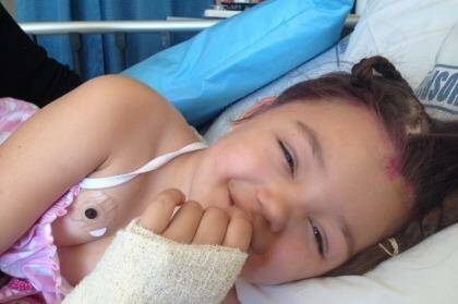 CHRISTMAS CHEER: Days after waking from brain surgery at Starship children's hospital, Lower Hutt four-year-old Milan Ellis is eager to get home by Christmas Day.