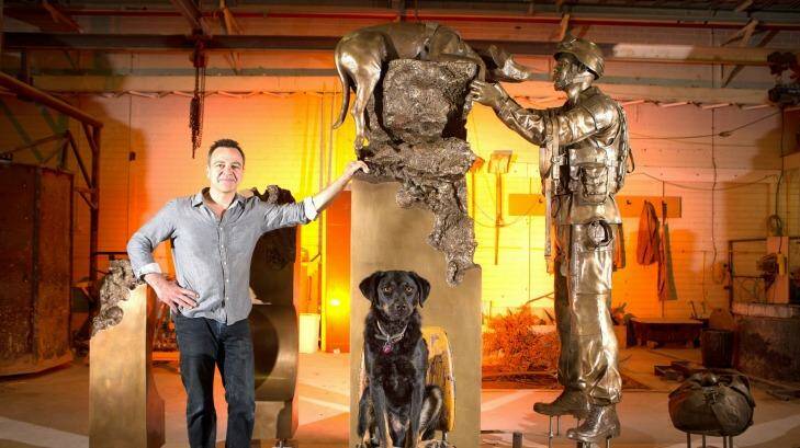 Melbourne sculptor Ewen Coates with his new War Memorial sculpture commemorating bomb sniffer dogs. Photo: Jason South