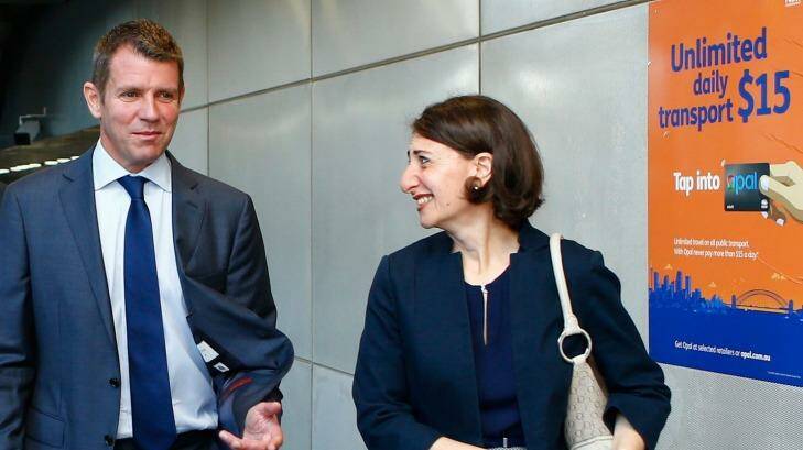 Tipped for Treasurer: Gladys Berejiklian with Premier Mike Baird. Photo: Daniel Munoz
