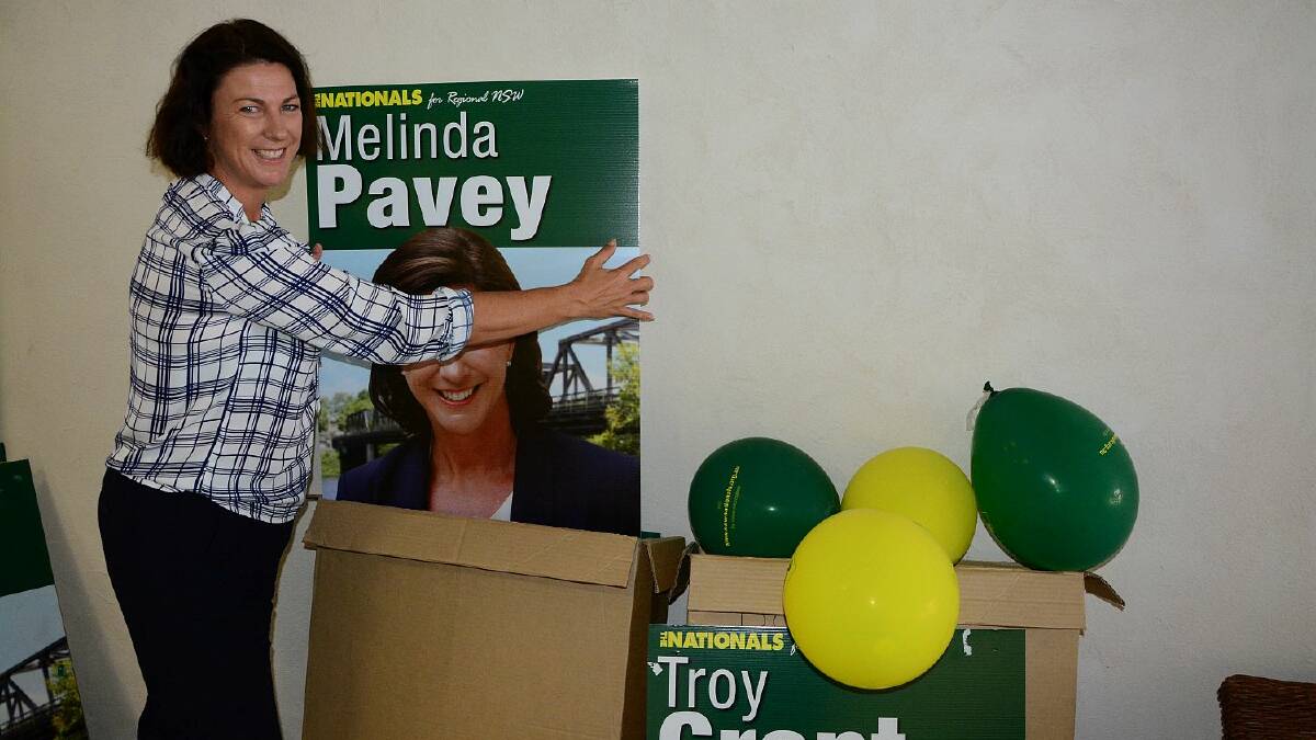 On with the job: new member elect for Oxley, Melinda Pavey, packs away campaign posters at her headquarters in Smith St yesterday after her successful campaign to retain the seat for the Nationals
