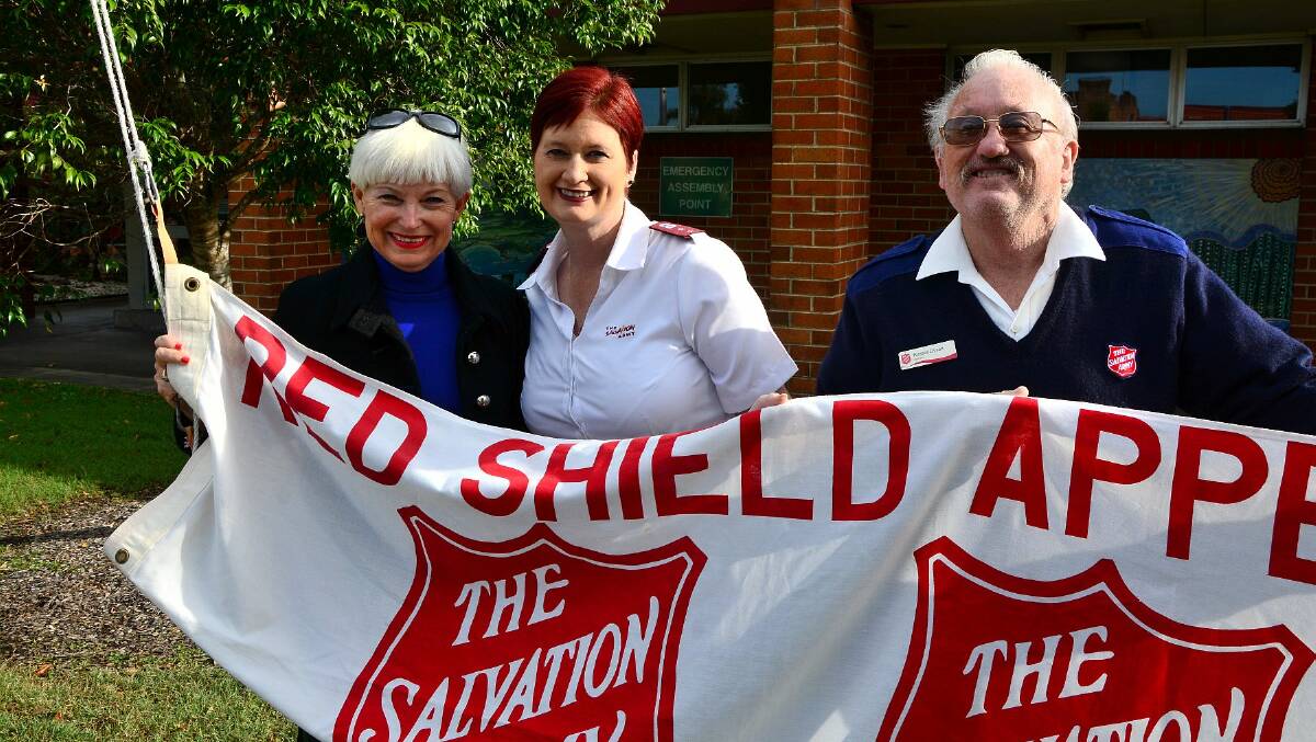 Dig deep: the Salvos annual Red Shield fundraising appeal is on this week. Mayor Liz Campbell, Captain Karen Keddie and Russell Dyson launched the 2015 appeal at the council chambers yesterday.