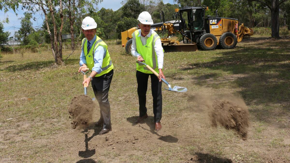 Not long to go: member for Oxley Andrew Stoner (right) turned the first sod on the Kundabung to Kempsey Pacific Highway upgrade with federal member for Lyne Dr David Gillespie this week