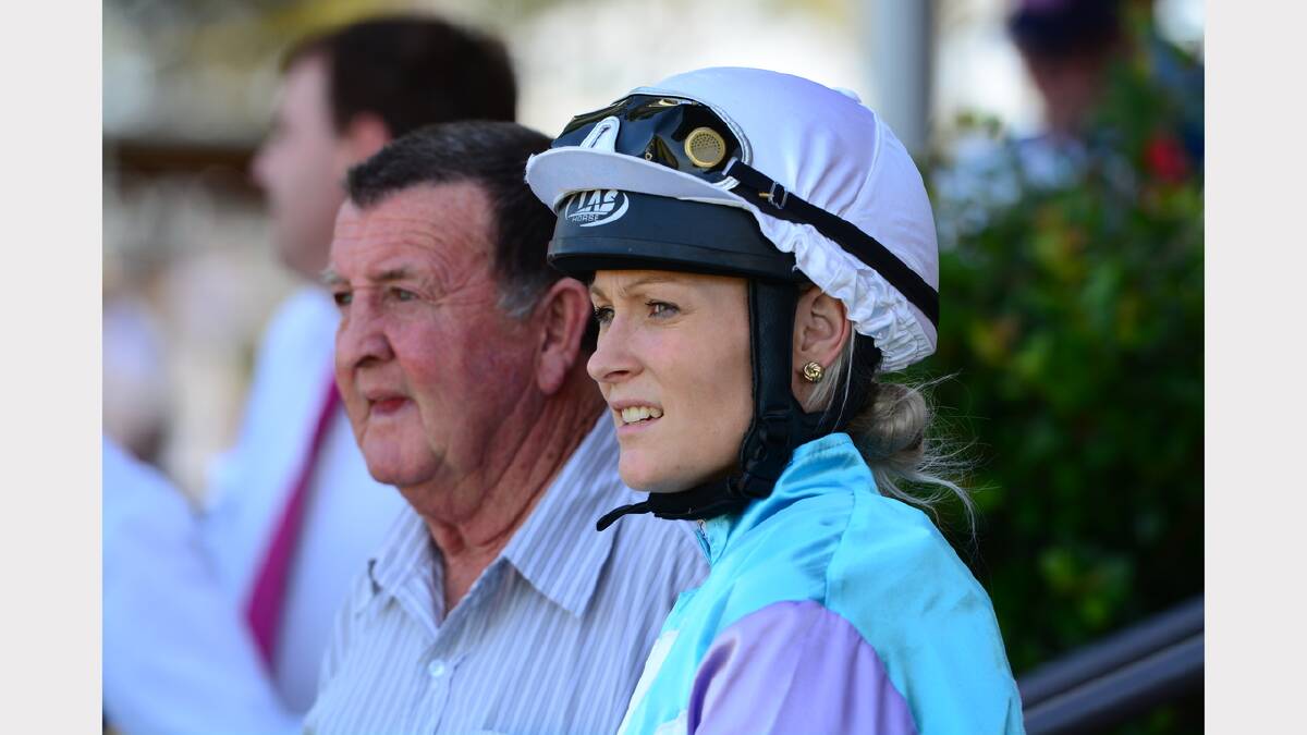 Local hopes: trainer Barry Ratcliff and jockey Melinda Graham in the mounting yard before the running of the Kempsey Cup on Friday. Their horse Butane ran third, giving some people their money back. Picture by Todd Connaughton
