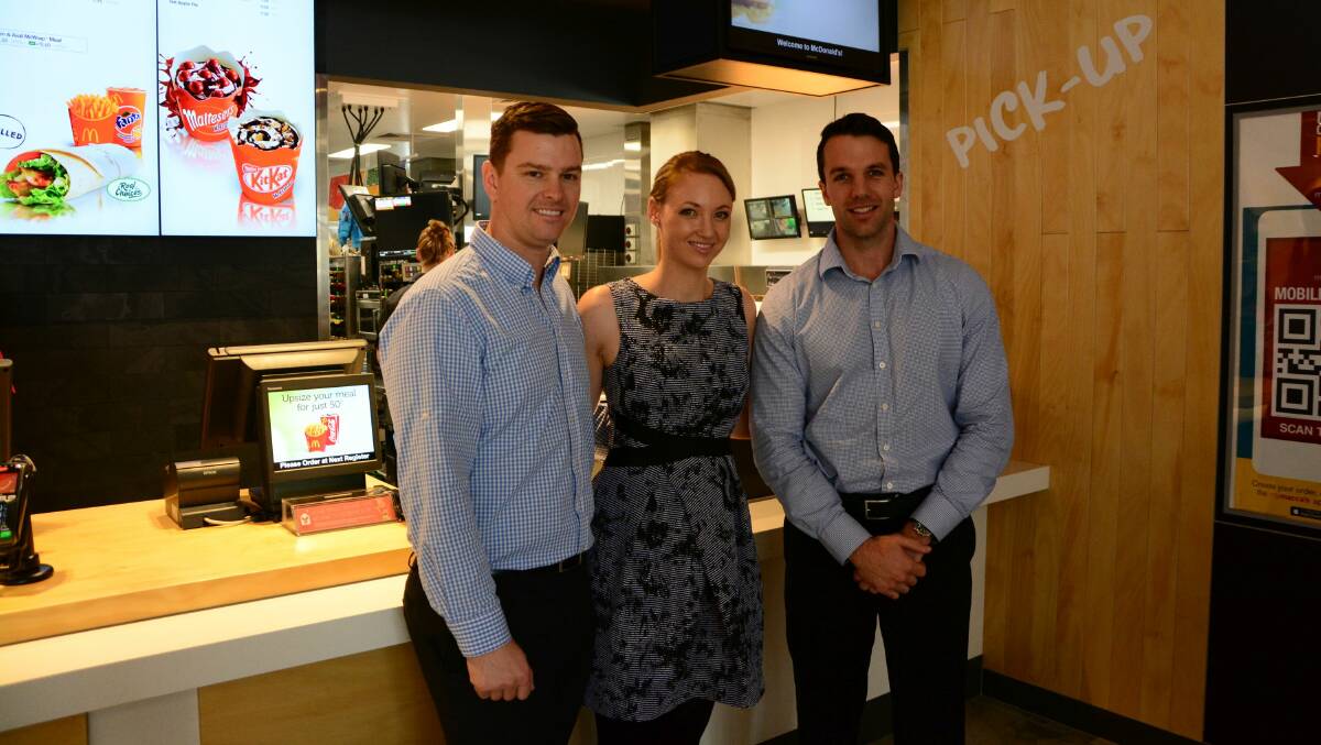 Opening day: McDonald's licensee, Adrian Sippel, Natasha Sippel and store general manager Luke McDonald