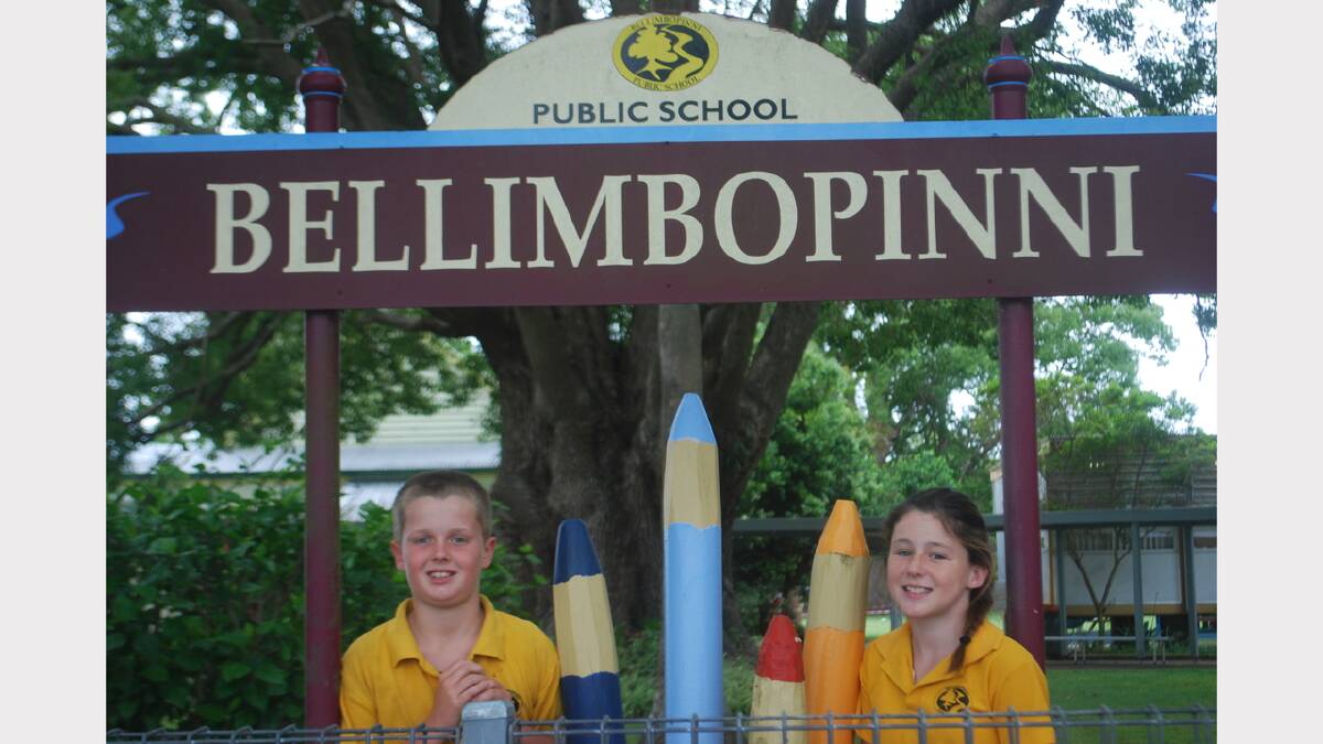 Rich history: Bellimbopinni Public School students Tristan Moran (left) and Shinae Henderson outside the school ahead of the anniversary function on Sunday