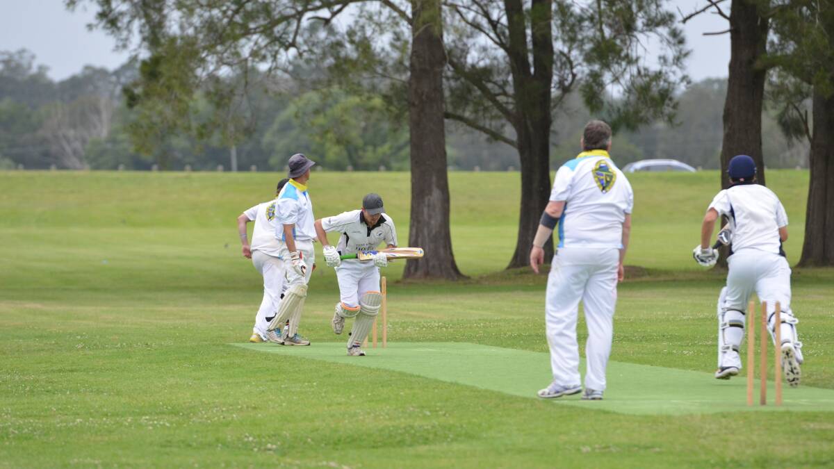 Born to run: The Rovers Tim Smith and Zeb Johnson run between the wickets while Kempsey Heights bowler Dan Wade watches on 