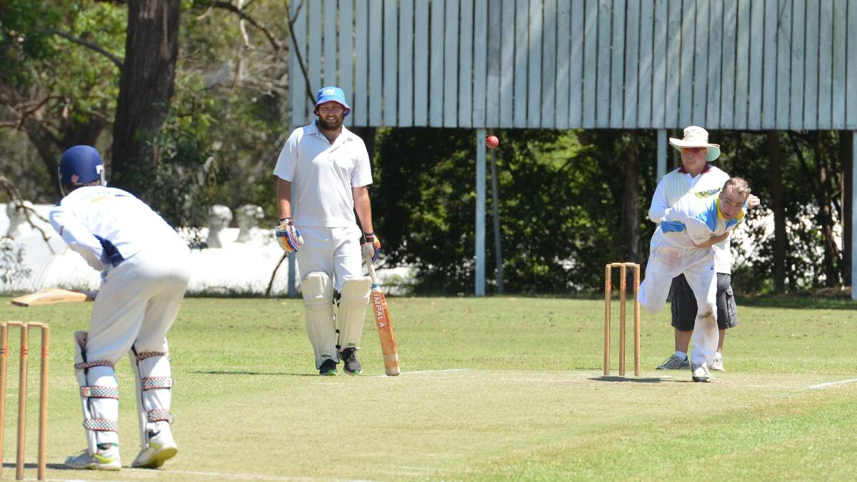 Fight for survival: South West Rocks take on Nulla tomorrow who were surprisingly beaten last week by Kempsey Heights. Picture: Nulla’s Phil Dowling bowls to the Heights while Beau Hawtin looks on. Photo: Penny Tamblyn 