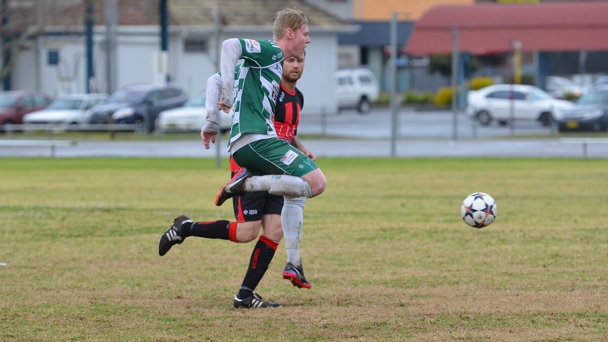 Headed for glory: Troy Ward’s brace against Camden Haven Redbacks  last Saturday helped Kempsey Saints maintain their semi-finals spot, thanks also to Port Saints surprise defeat to Wingham Warriors. Picture by Penny Tamblyn.