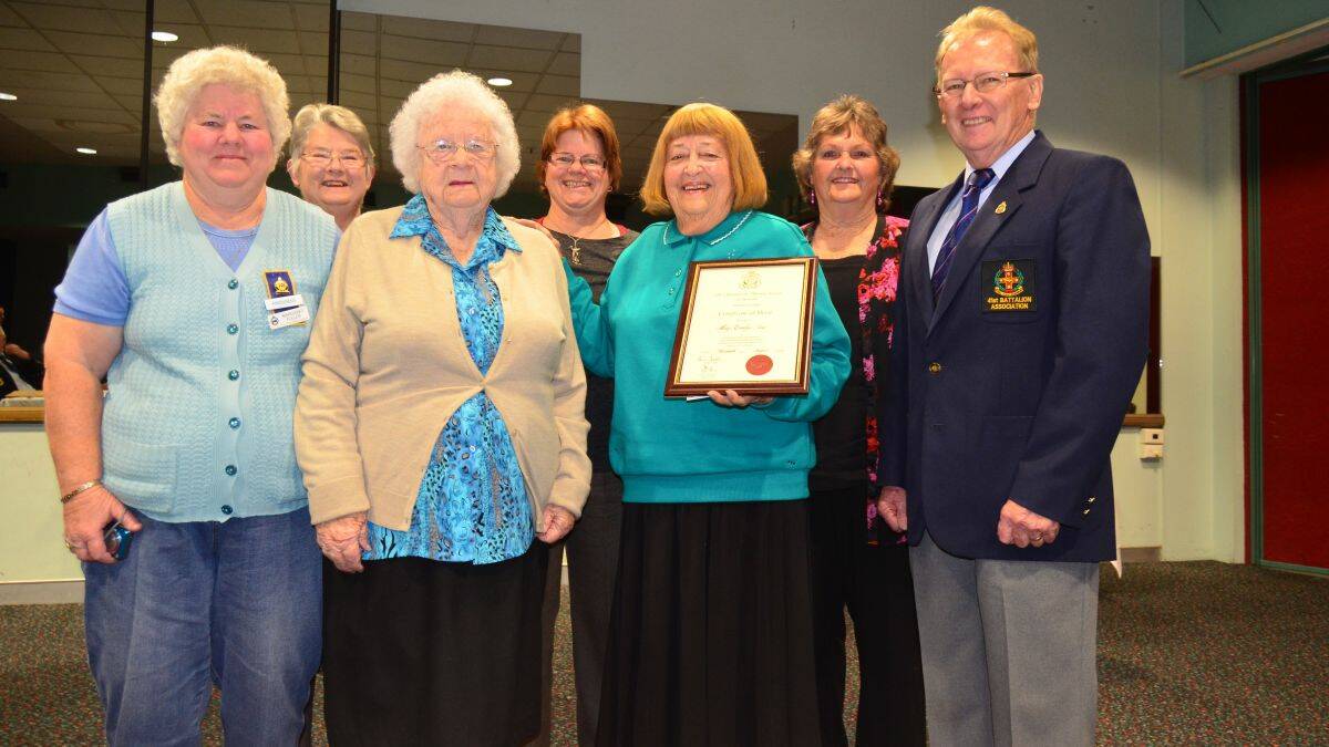 Continued support: Kempsey-Macleay RSL Sub-branch Women’s Auxiliary member Mary Tarr with her Certificate of Merit. Among those attending the presentation luncheon were Mary Fuller (Auxiliary president), Elaine Brown (treasurer), Noeline Thompson (life member), Marion Morgan (secretary), Betty Lee (life member) and RSL Sub-branch treasurer John Supple.
