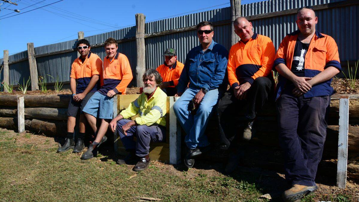 Showground manager Steve Rowe (third from right), Martin Harrison (second from right) and Pierre Wilkinson from Novaskill (third from left, front) with the Work for the Dole crew at Kempsey Showground yesterday.