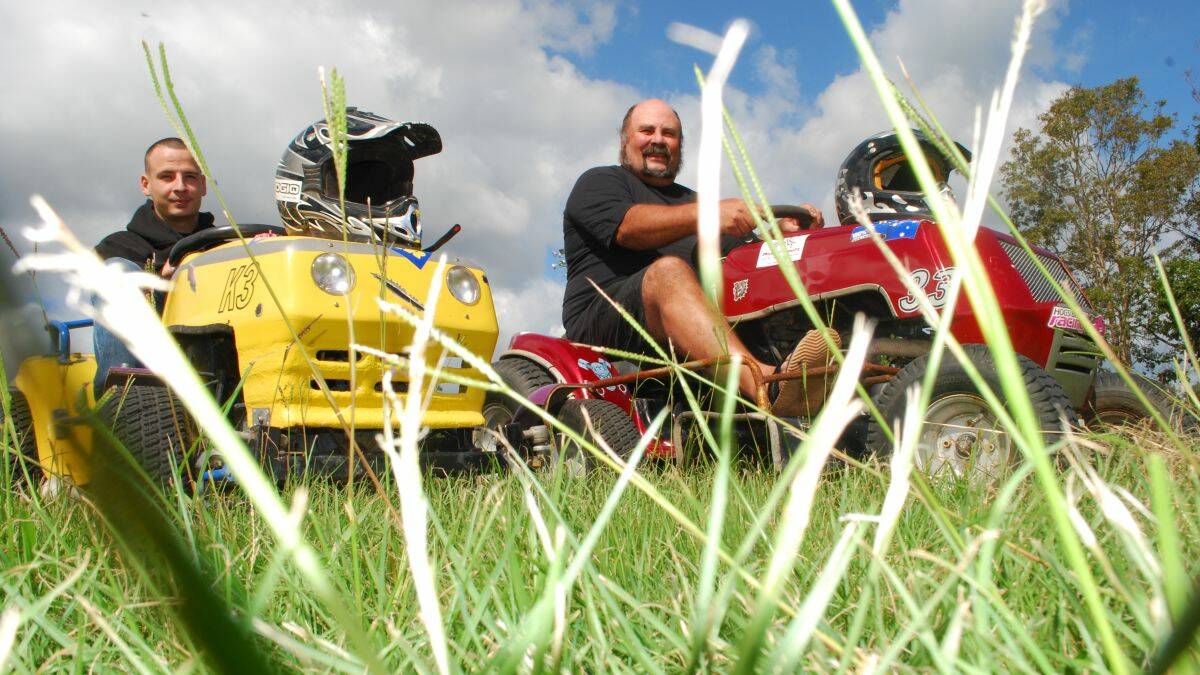 Ride-on time: Kempsey Mower Racing Club vice-president Ron Dennis and his son Ronnie will compete on their customised machines at Kempsey Showground this Sunday