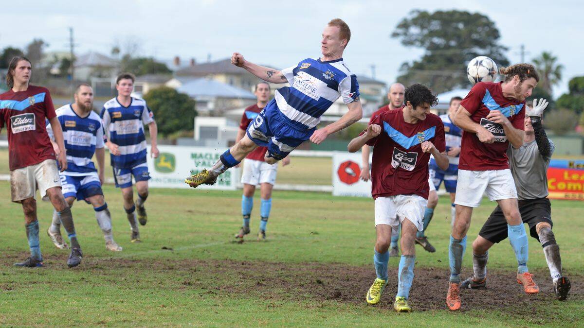 Aerial attack: Andrew Potter throws himself at a cross last Saturday, in a bid to head past the Port FC defence.