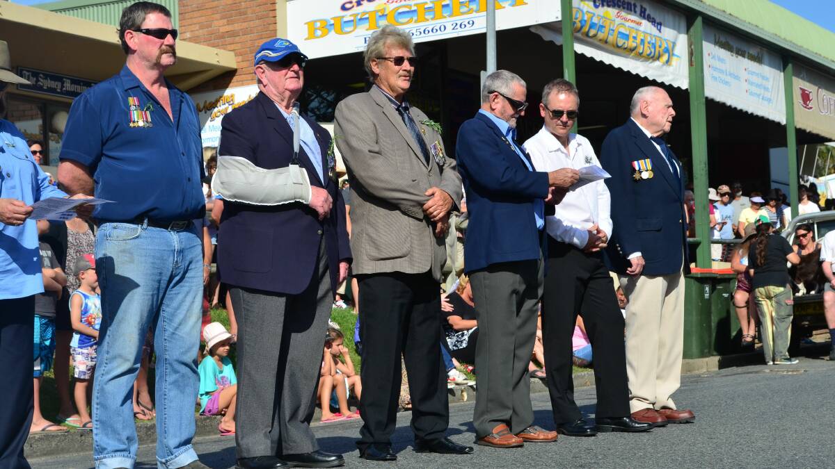 Blue skies: autumn sunshine helped to bring out large crowds at Crescent Head on Anzac Day.