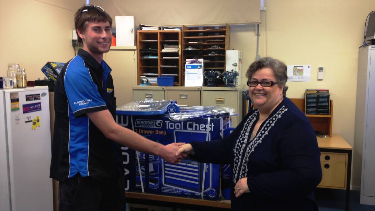 Local apprentice Mitch Martin being presented with a $2000 toolbox by Bonnie Hillsley as part of the Macleay Valley Education Fund’s (MVEF) scholarship.  