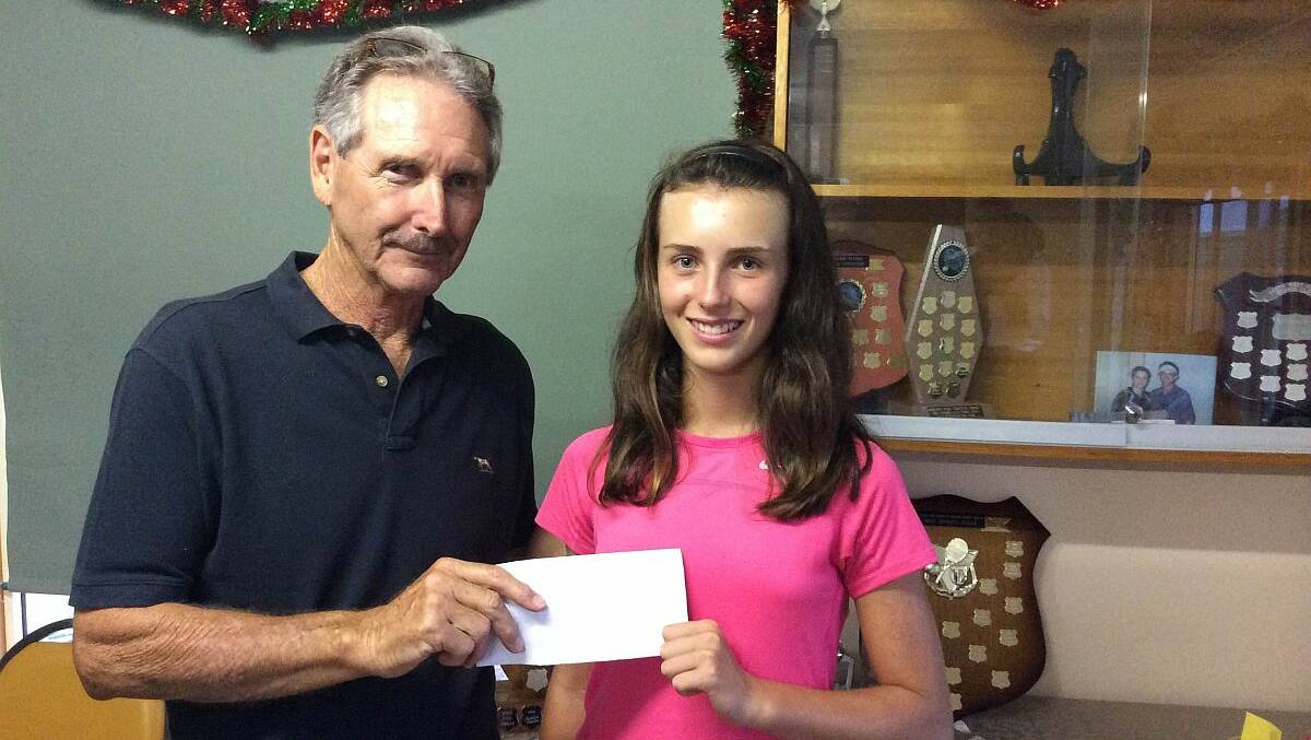 Rising star: South West Rock Country Club president Brian Strathmore kindly donates funds to rising tennis star Ashley Allman who is currently playing at the 2014, 12 and under Australian Tennis Championships