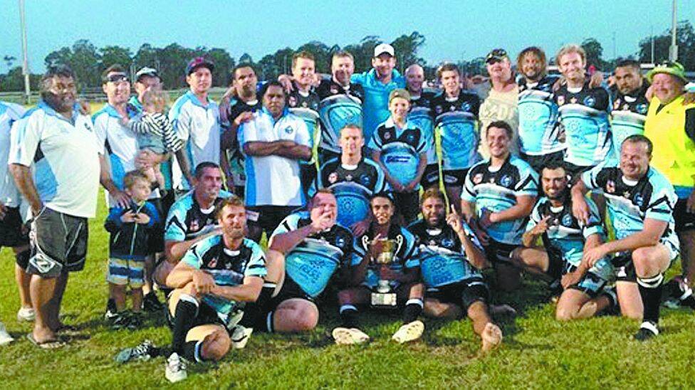 Victorious: the South West Rocks Marlins with the Bain Cup in Wauchope.