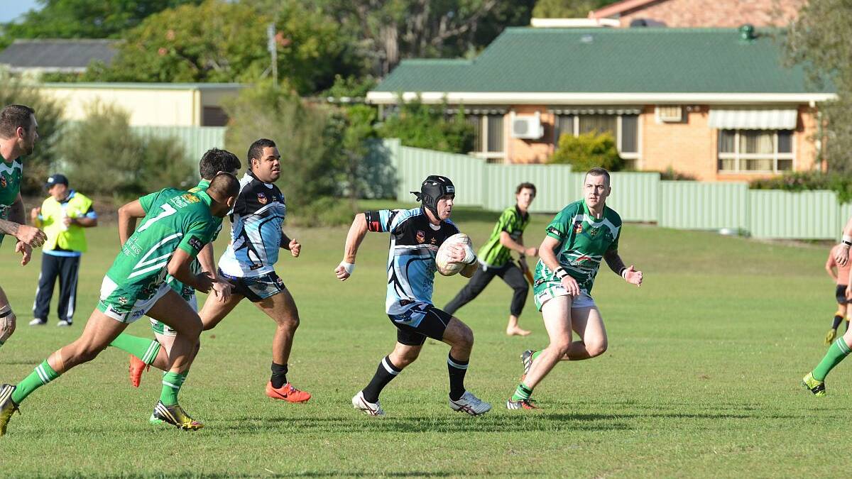 Attacking push: Paul Owens takes the ball forward for the South West Rocks Marlins in their match against the Beechwood Shamrocks on Saturday. Photo: Penny Tamblyn